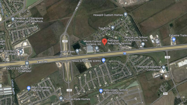 Satellite map view showing highways, roads, and businesses in a semi-urban area where green spaces excel alongside key facilities.